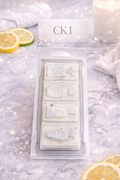 CK1 wax melts in a premium perfume style clamshell—perfect for a crisp, unisex home fragrance.
